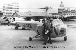 Colonel C. J. Tippett and Joe Mashman set first in flight records in helicopters in 1947.